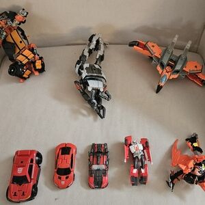Mudflap/Topspin/Jhiaxus & 5 other Transformers. Sold as a lot of 1